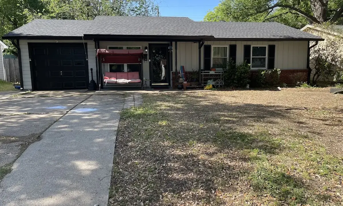 Asphalt Shingle Roof Repair crew at work on a residential roof in Southeast